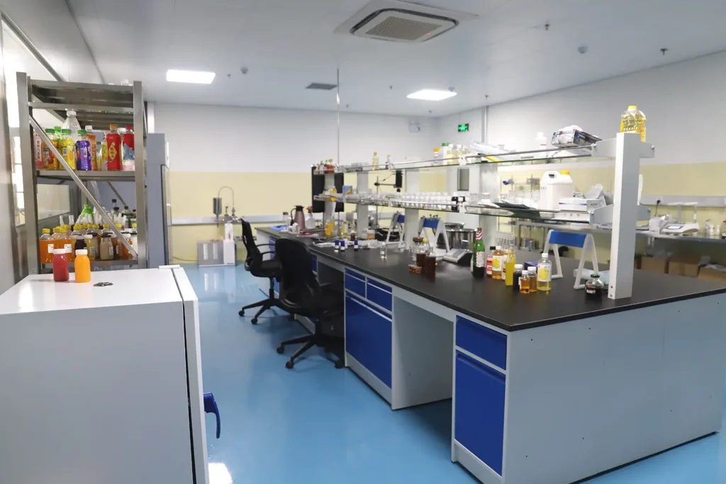 Beverage application laboratory with drink samples, flavor bottles and food testing equipment
