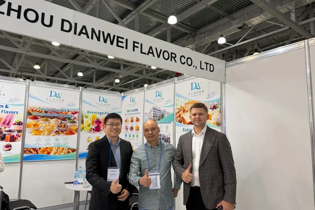 DW Flavor representatives meeting a visitor at their AGROPRODMASH 2026 exhibition booth